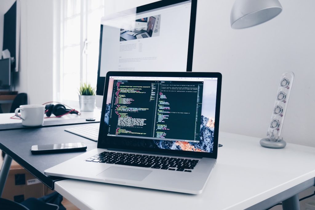 Image of laptop on counter doing code